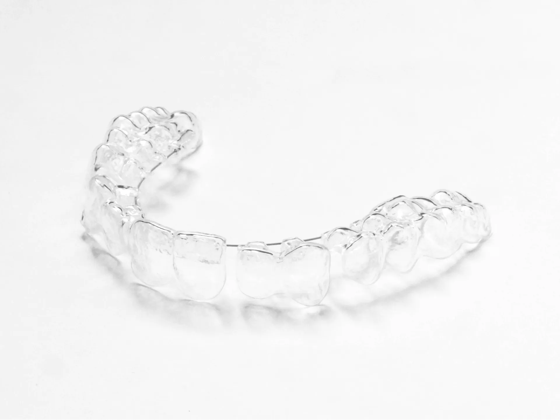 Close-up of a clear dental aligner